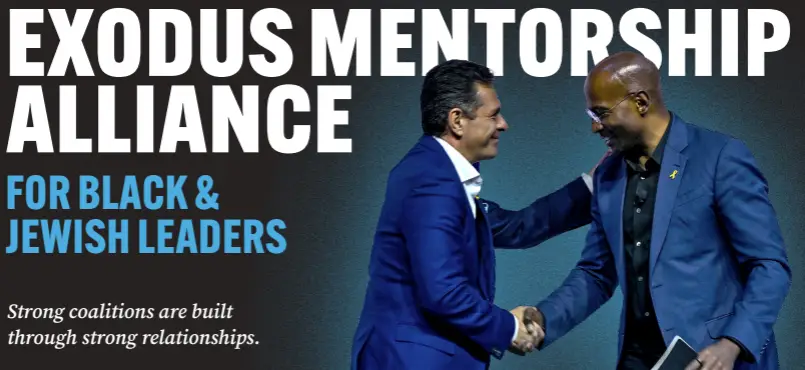 Van Jones and Daniel Lubetzky shaking hands on stage at the Exodus Mentorship Alliance launch
